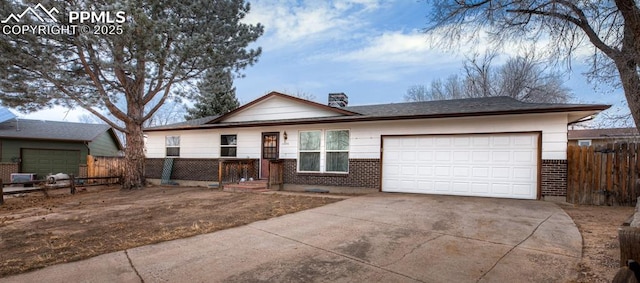 single story home featuring a garage