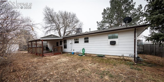 rear view of house with a deck