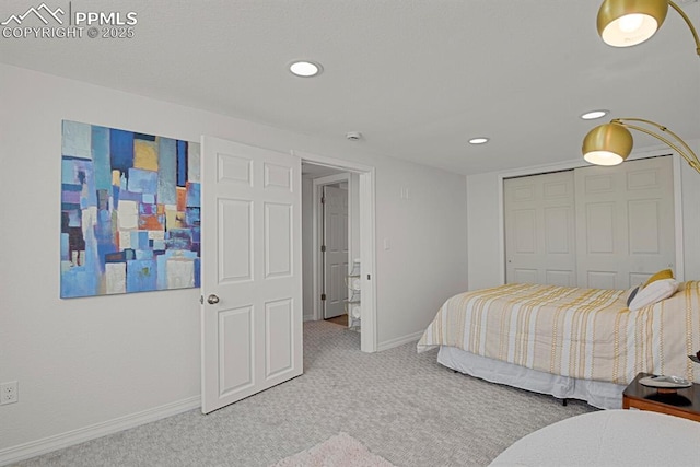 carpeted bedroom with a closet