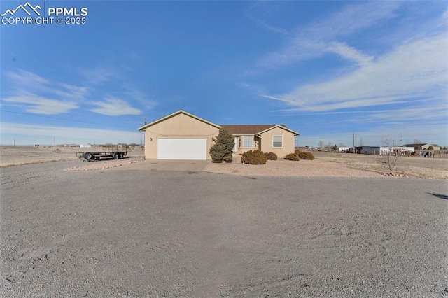 ranch-style house with a garage