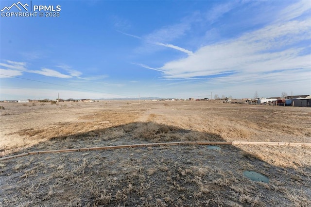 view of yard featuring a rural view