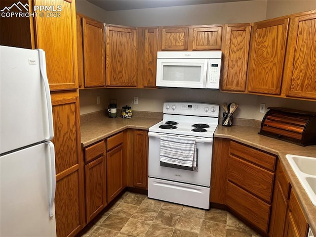 kitchen with white appliances