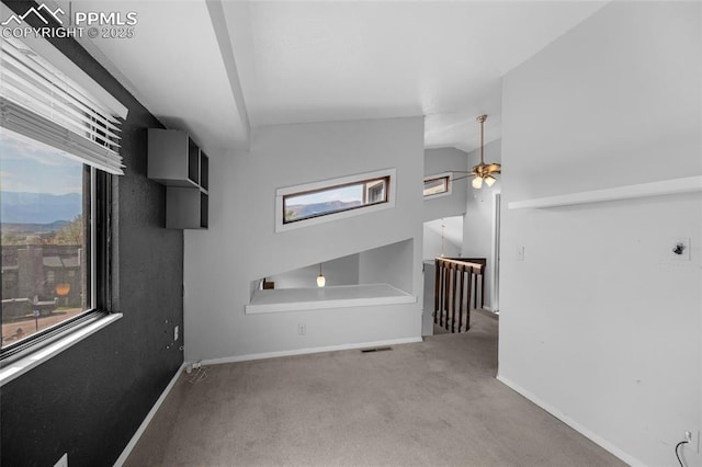 bathroom featuring a wealth of natural light and ceiling fan