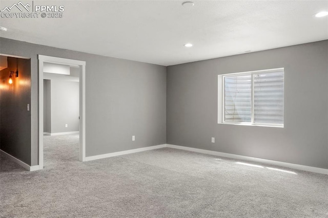 unfurnished room with carpet floors