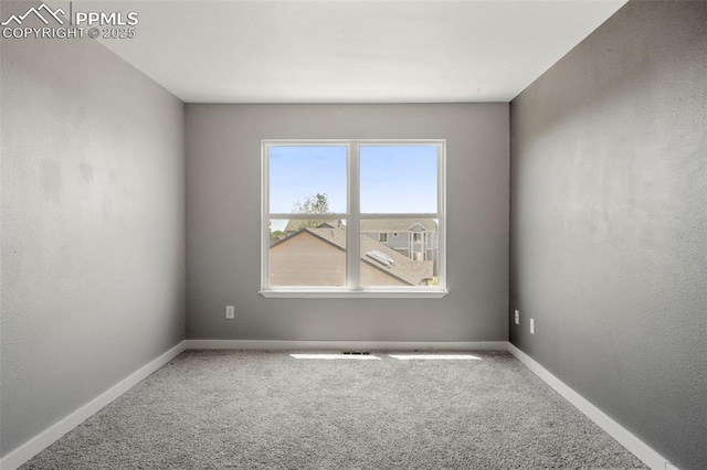 empty room with carpet floors