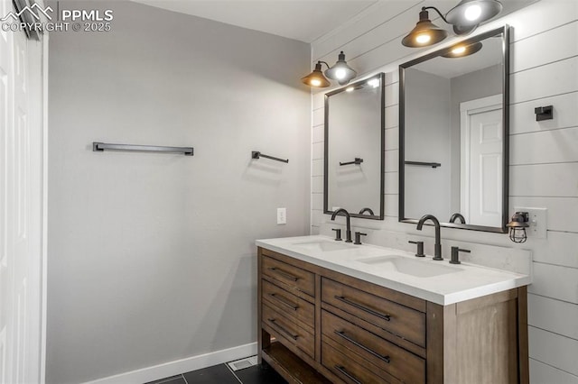 bathroom with tile patterned floors and vanity