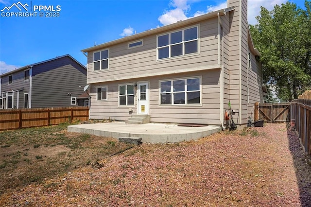 rear view of property with a patio