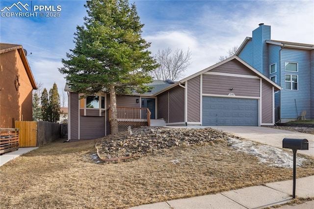 view of front of property featuring a garage