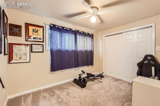 interior space with carpet flooring, a closet, and ceiling fan