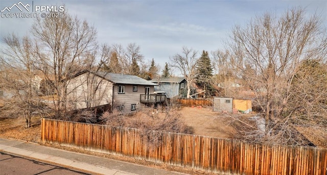 view of front of house with a wooden deck