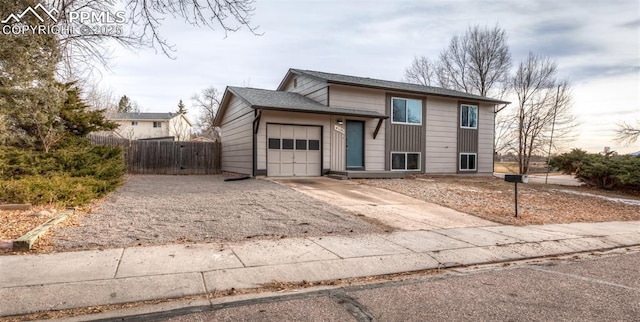 view of front of property with a garage