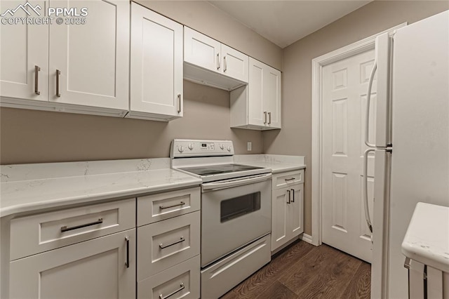 kitchen with light stone countertops, white cabinetry, dark hardwood / wood-style flooring, and white appliances