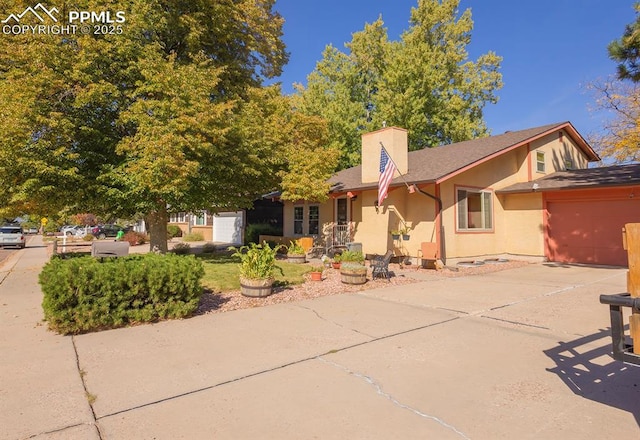 view of front of home with a garage