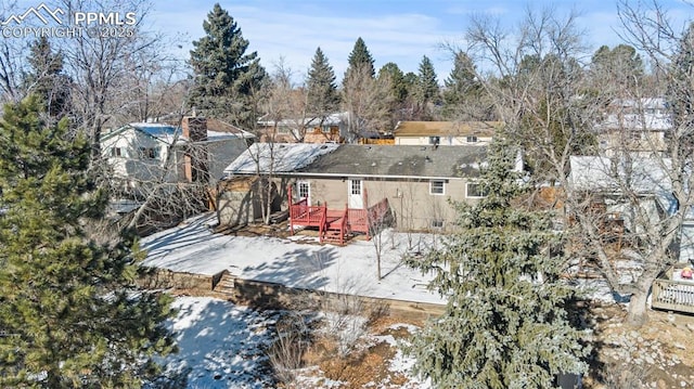 view of snow covered property