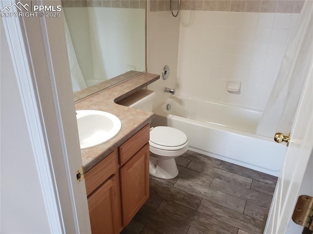 full bathroom featuring vanity, shower / bath combination with curtain, and toilet