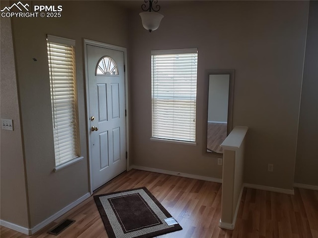 entrance foyer featuring light hardwood / wood-style floors