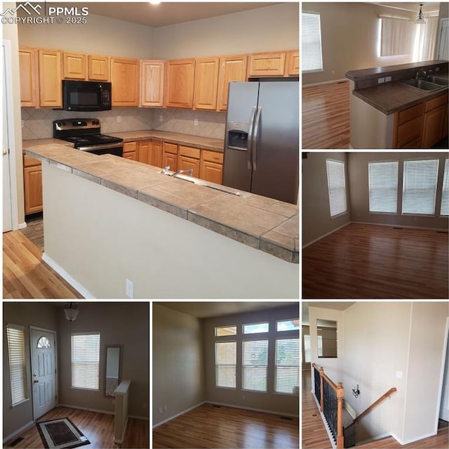 kitchen with decorative backsplash, wood-type flooring, stainless steel appliances, and sink