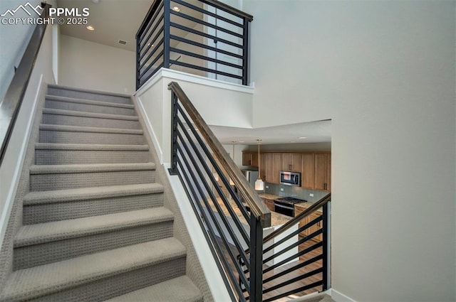 stairs with a towering ceiling