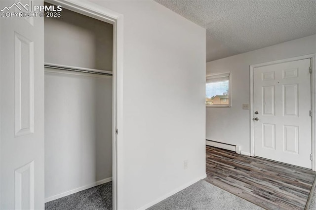 closet with baseboard heating