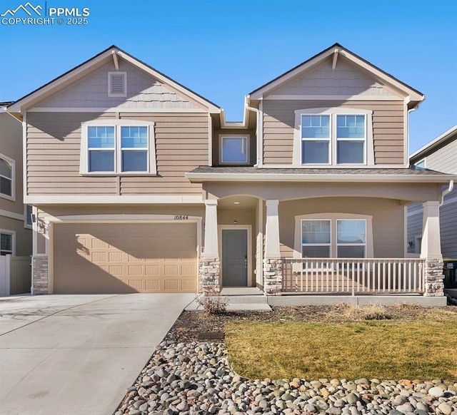 craftsman-style home with a porch and a garage