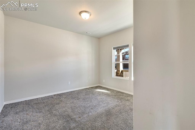 view of carpeted spare room