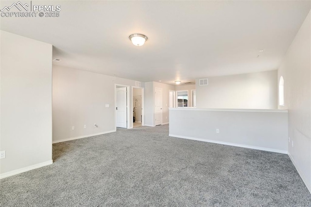 unfurnished room featuring carpet floors