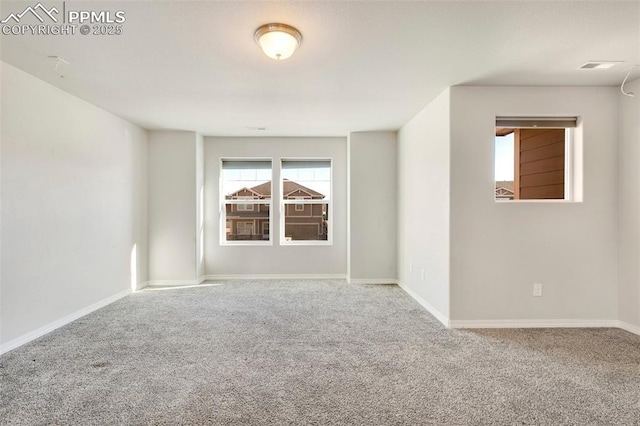 view of carpeted spare room