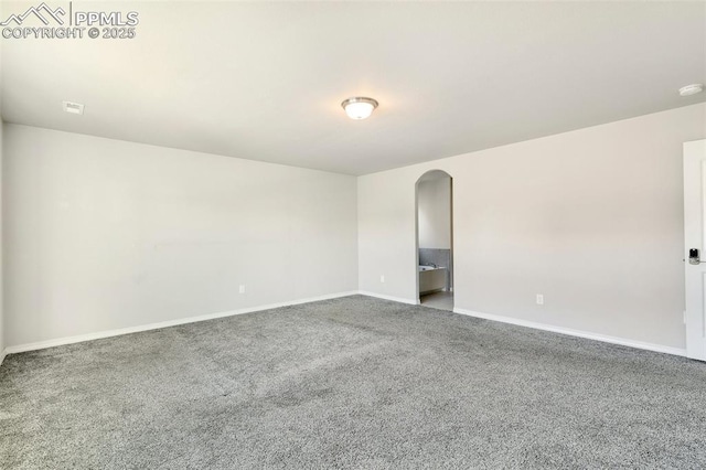 unfurnished room with carpet