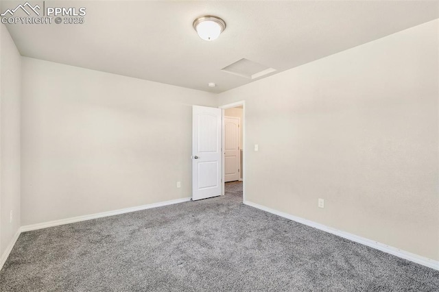 spare room featuring carpet floors