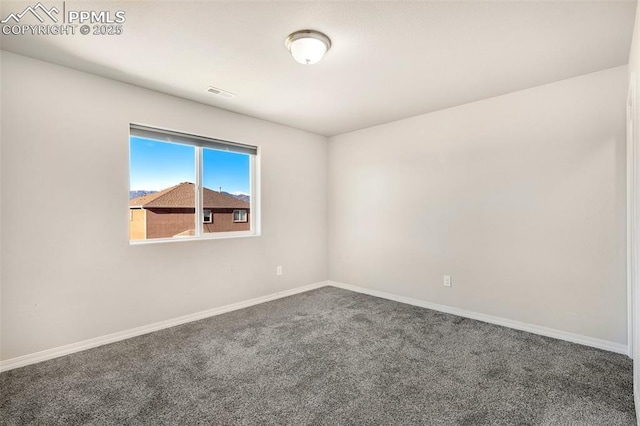 view of carpeted spare room