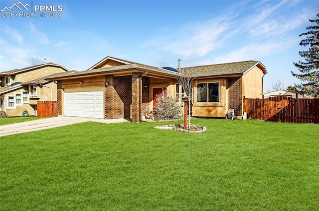 ranch-style house featuring a garage and a front lawn