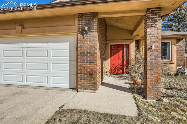 entrance to property with a garage