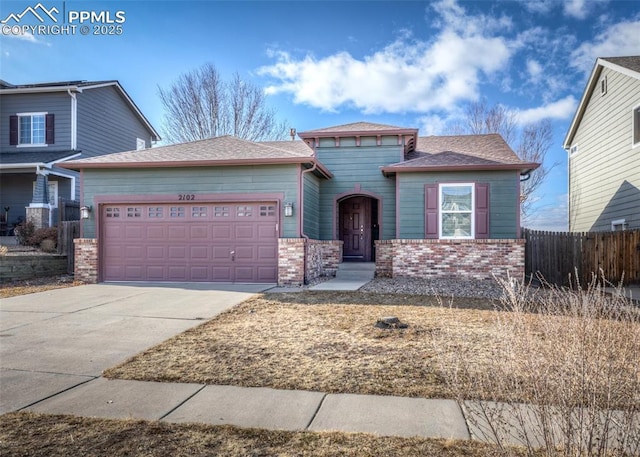 view of front of property featuring a garage