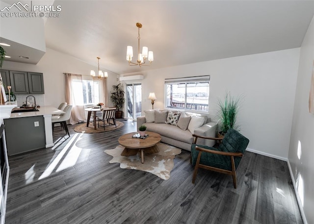 living room featuring a notable chandelier, a healthy amount of sunlight, dark wood-type flooring, and vaulted ceiling