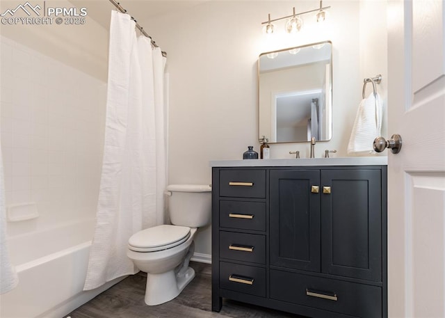 full bathroom featuring toilet, vanity, shower / bath combination with curtain, and hardwood / wood-style flooring