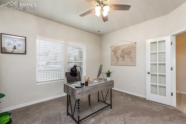 home office with carpet flooring and ceiling fan