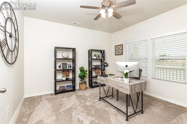 office area with carpet flooring and ceiling fan