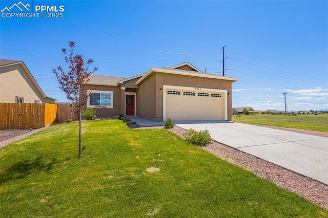 ranch-style home featuring a garage and a front lawn