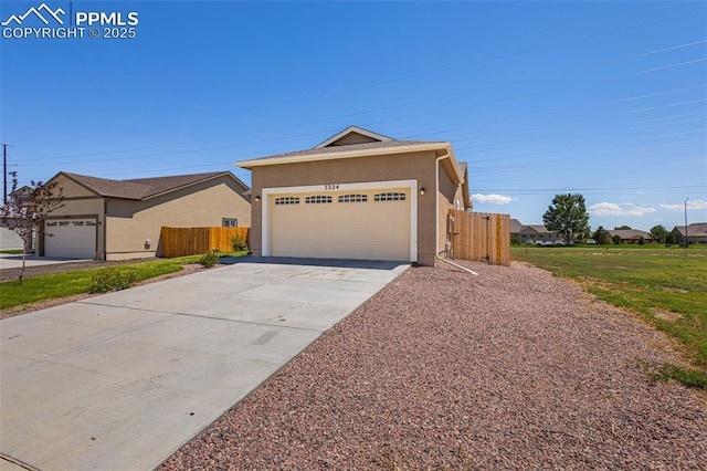 ranch-style house featuring a garage