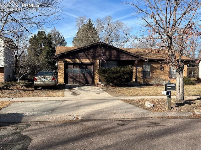 single story home with a garage