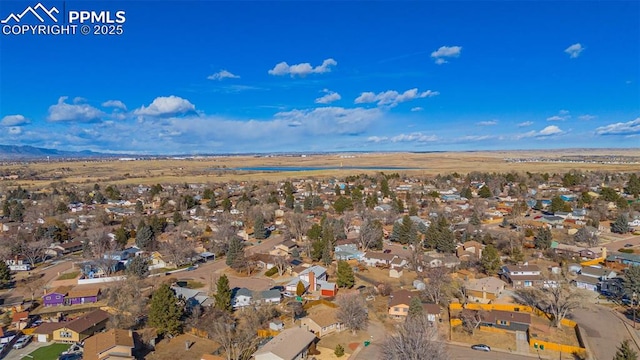 drone / aerial view featuring a mountain view