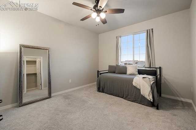 bedroom with ceiling fan and light colored carpet