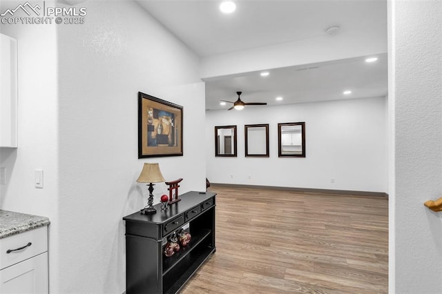 hallway featuring light hardwood / wood-style floors