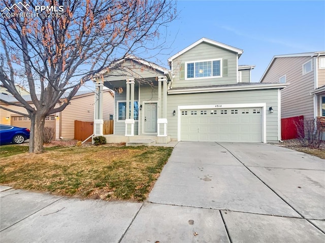 view of front facade featuring a front yard and a garage