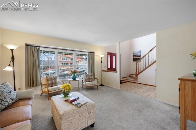 living room with light colored carpet