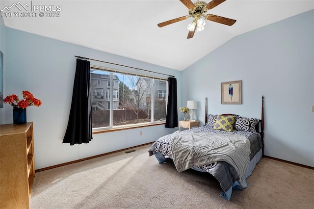 bedroom with lofted ceiling, carpet floors, and ceiling fan