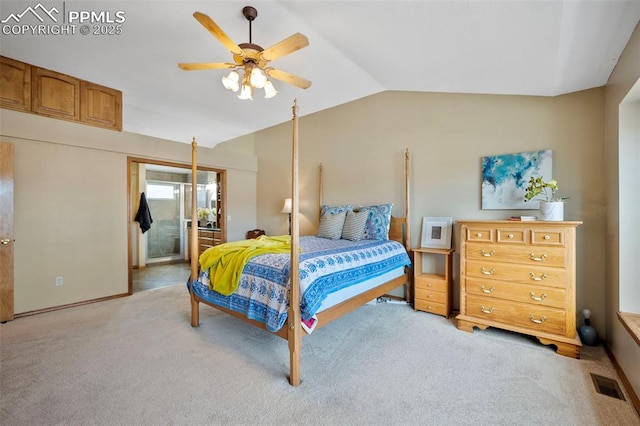 bedroom featuring lofted ceiling, light colored carpet, and ceiling fan