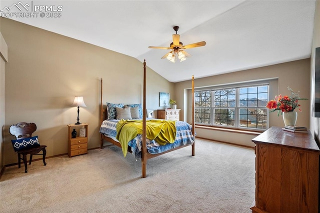 carpeted bedroom with lofted ceiling and ceiling fan