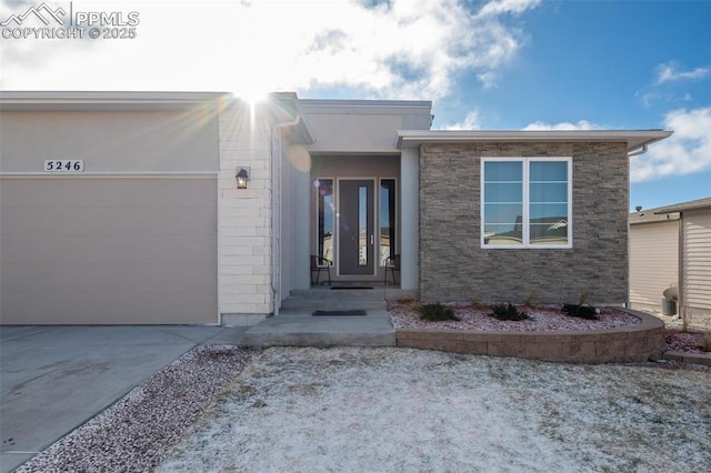 property entrance with a garage