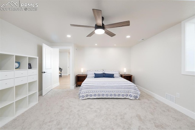 carpeted bedroom featuring ceiling fan